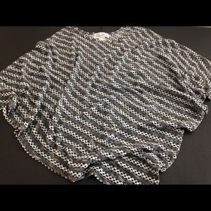 Sweater poncho, Sz L Black & White pattern w/holes